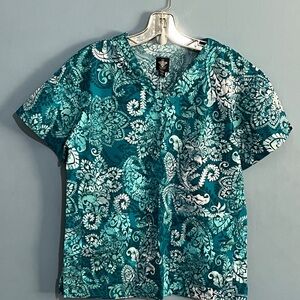 SELLING MED COUTURE SCRUB SIZE SMALL FLORAL COLOR SHORT SLEEVE CONDITION:USED